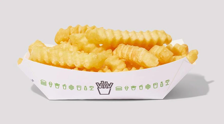 Shake Shack 的波浪薯条，炸至金黄酥脆，咸度适中，呈现经典快餐风味。
