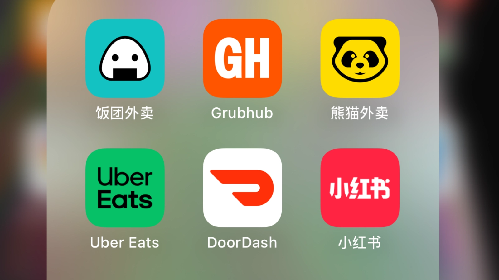 手机界面展示小红书与多款中美主流外卖平台App图标，包括Uber Eats、DoorDash、Grubhub、饭团外卖和熊猫外卖